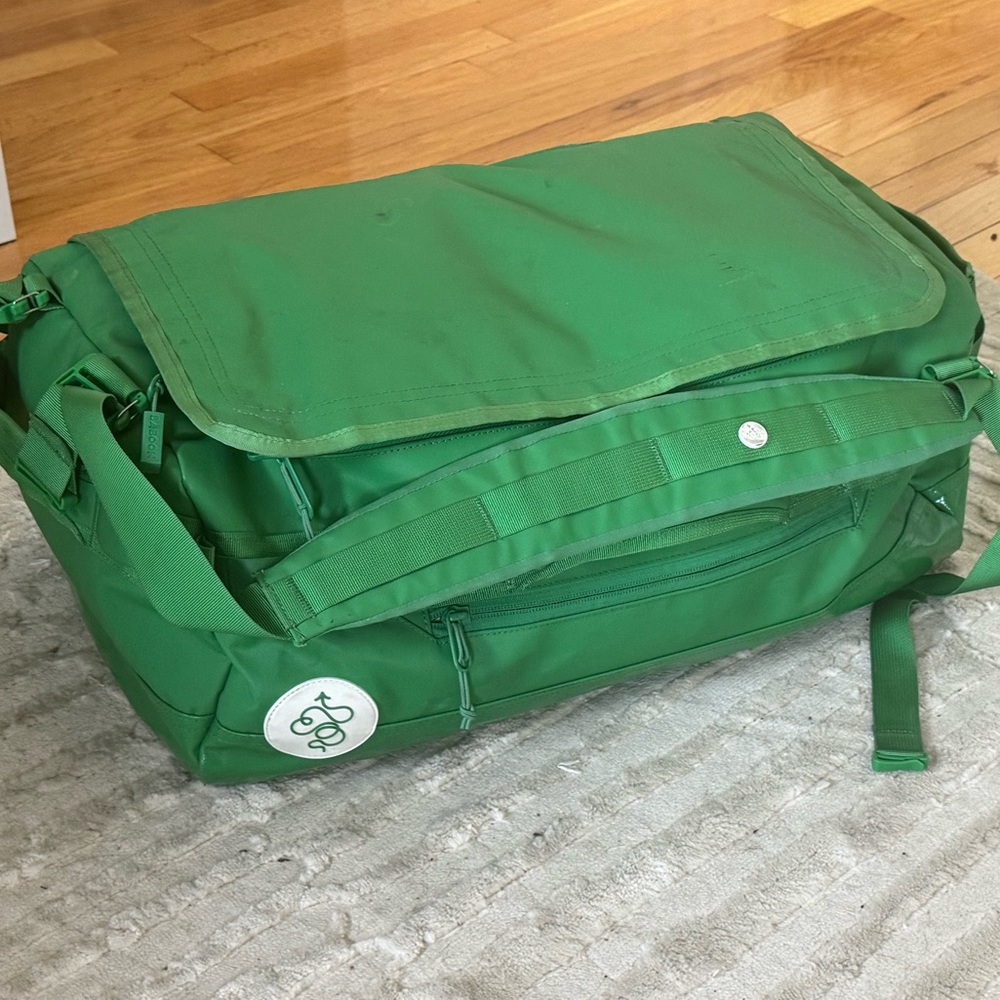 Baboon to the Moon B2TM 40L Go-Bag In Green w/ multicolor interior lining